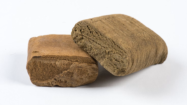 Dense pressed hash block with visible layered texture.